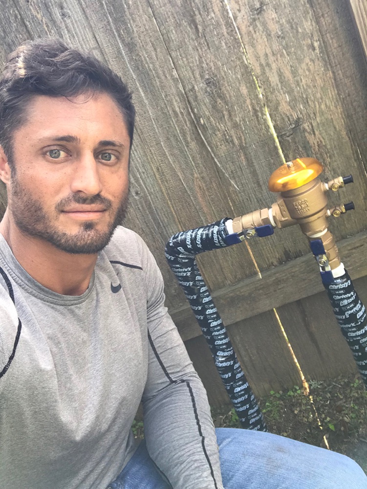 Elite Sprinkler technician on a repair visit in Cypress, TX